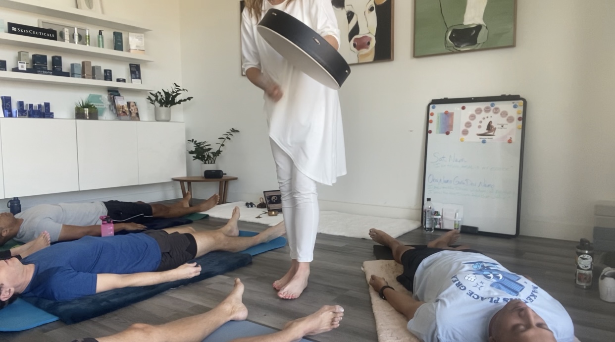 Lori facilitating a group relaxation and meditation session